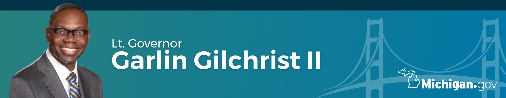 Website banner of Lt. Governor Gilchrist standing in front of the Mackinac Bridge