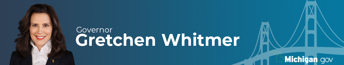 Website banner of Governor Whitmer standing in front of the Mackinac Bridge